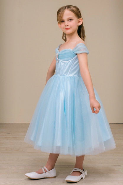 Shown in a angled view, the Blue girls formal dress has off-shoulder straps and pleated tulle skirt.