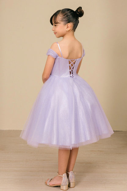 Displayed in a back view, the Lilac girls formal dress has thin shoulder straps and lace-up back above the tulle skirt.