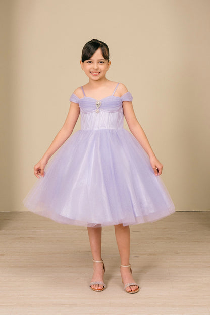 girl is wearing a lilac Off-Shoulder Tulle Dress and smiling  on a beige background