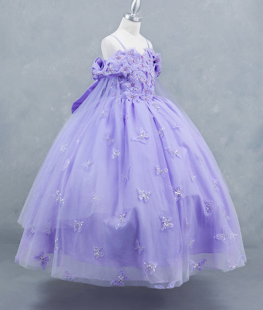 Lavender dress with floral details on a mannequin against a gray background