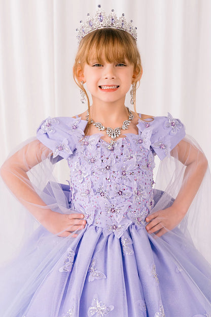 Young girl in a lilac mini quince  dress with floral embellishments and a tiara against a white background