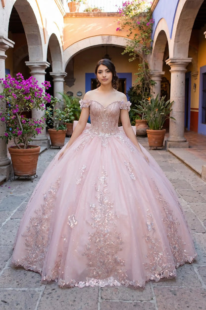 Front view of a rose gold quinceanera dress with sweetheart bodice, vertical beadwork, 3D floral appliques, and chapel-length train