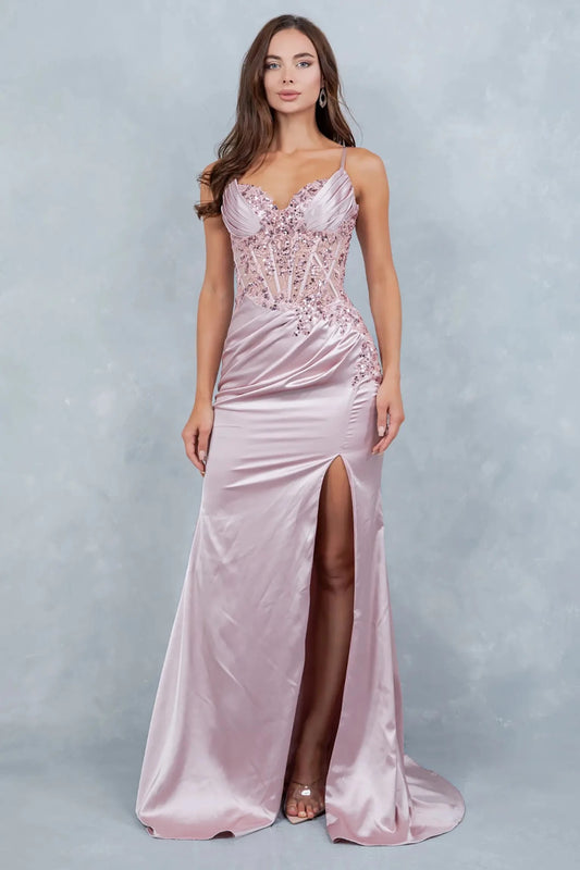 A full-length view of a woman wearing rose gold satin prom dress with a graceful silhouette.