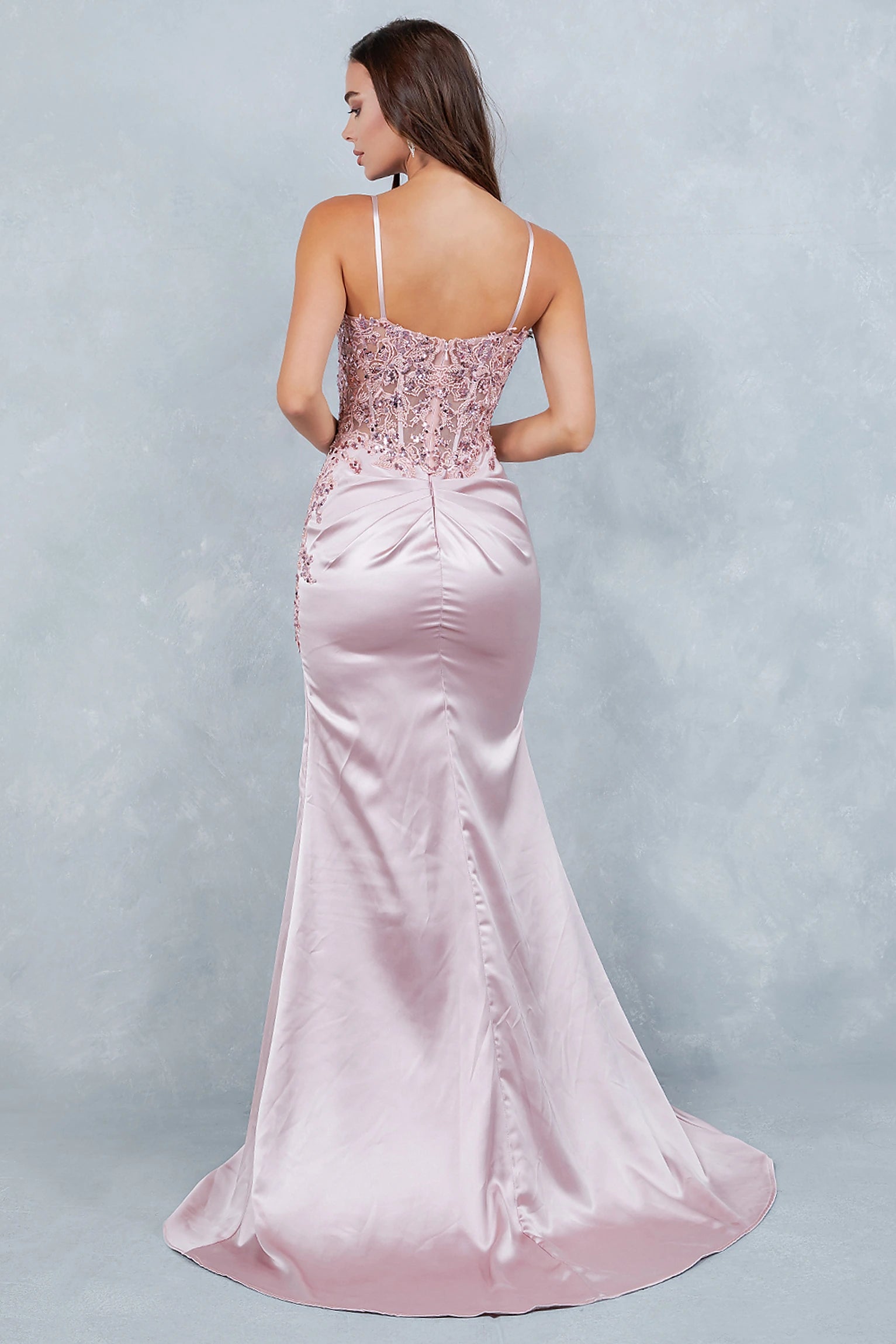 Dusty rose prom dress designed with open back and zipper closure