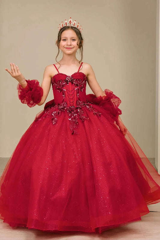 Front view of burgundy mini quinceañera mini quince dress with beaded bodice, floral appliqué, draped details, sparkling tulle skirt, and matching tulle arm cuffs.