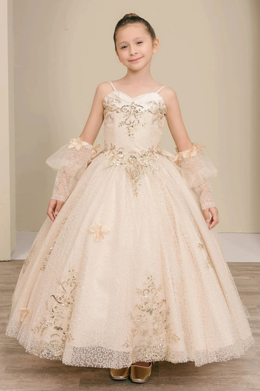 Front full-length view of Champagne mini quince mini quince dress with glitter floral embroidered bodice, full skirt, lace up back, oversized bow, and sheer lace gloves.