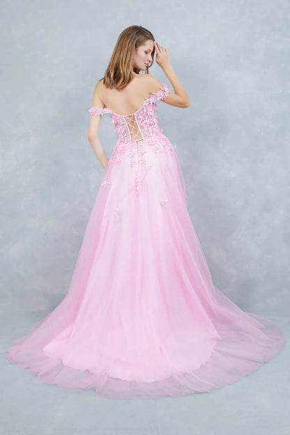 Full back view of a woman wearing a pink fairytale dress showcasing a lace-up corset and flowing tulle layers.