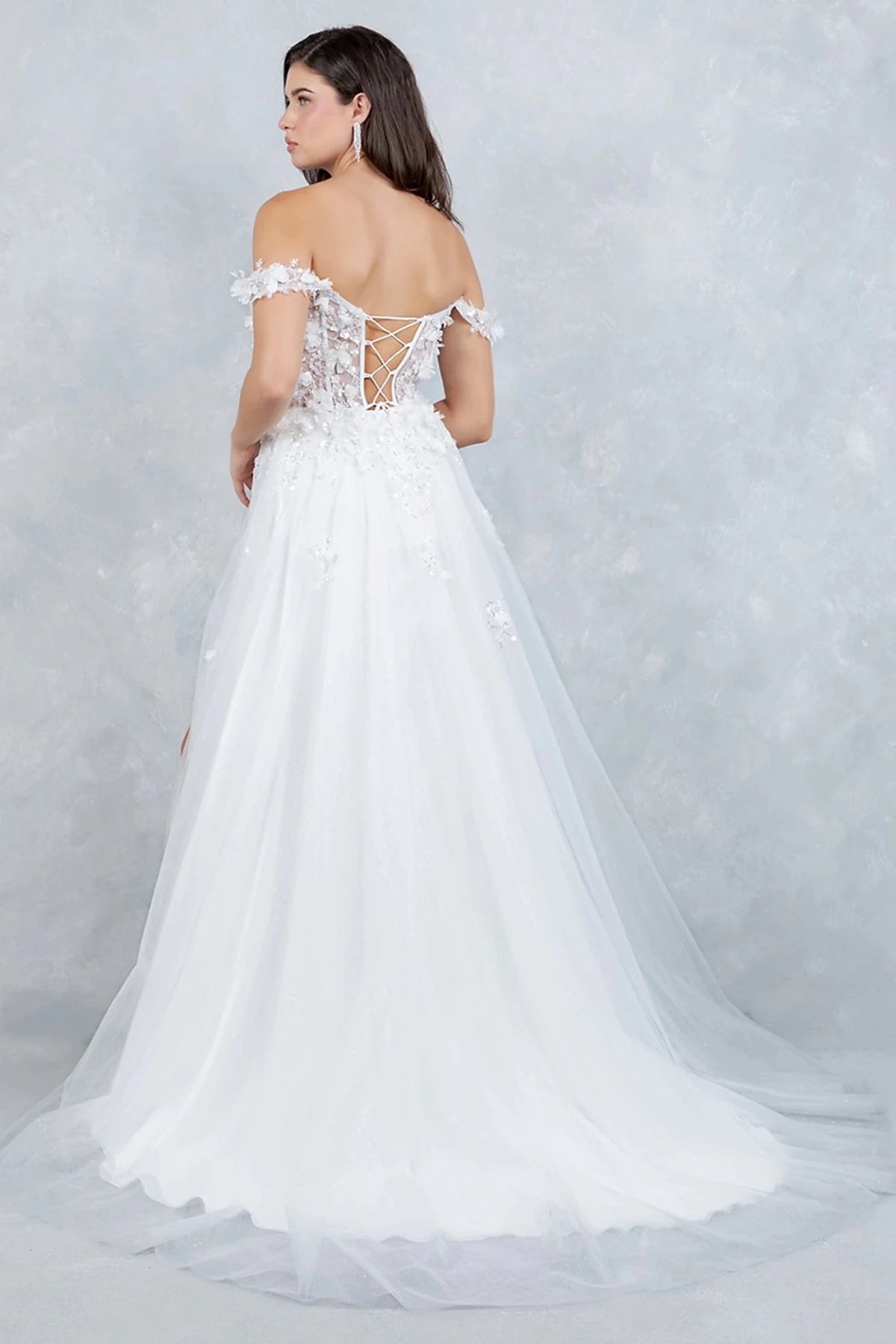 White prom dress styled with lace-up back for adjustable flattering fit and fairytale touch