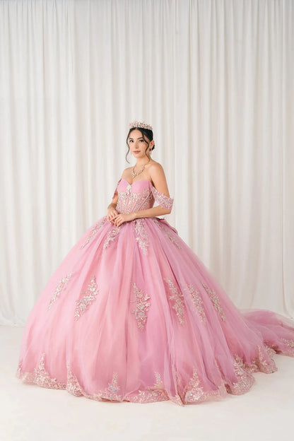 Front full-length view of Dusty Rose Off shoulder quinceañera ball gown with beaded corset, floral appliqués, layered tulle skirt, cathedral length train, and bow
