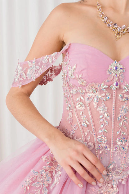Front half close-up view of Dusty Rose Off shoulder quinceañera ball gown with beaded corset, floral appliqués, layered tulle skirt, cathedral length train, and bow