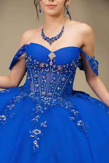 Front half close-up view of Royal Off shoulder quinceañera ball gown with beaded corset, floral appliqués, layered tulle skirt, cathedral length train, and bow