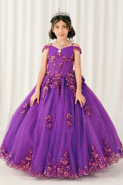 Front full-length view of Magenta Rose mini quince off shoulder ball gown with embroidered bodice, gemstone accent, glitter tulle skirt, lace up back, and oversized bow