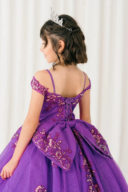 Back close-up Magenta Rose mini quince off shoulder ball gown with embroidered bodice, gemstone accent, glitter tulle skirt, lace up back, and oversized bow
