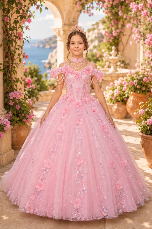 Pink kids quinceañera mini quince dress with glitter tulle skirt, and beaded corset bodice decorated with 3D flowers and pearls.