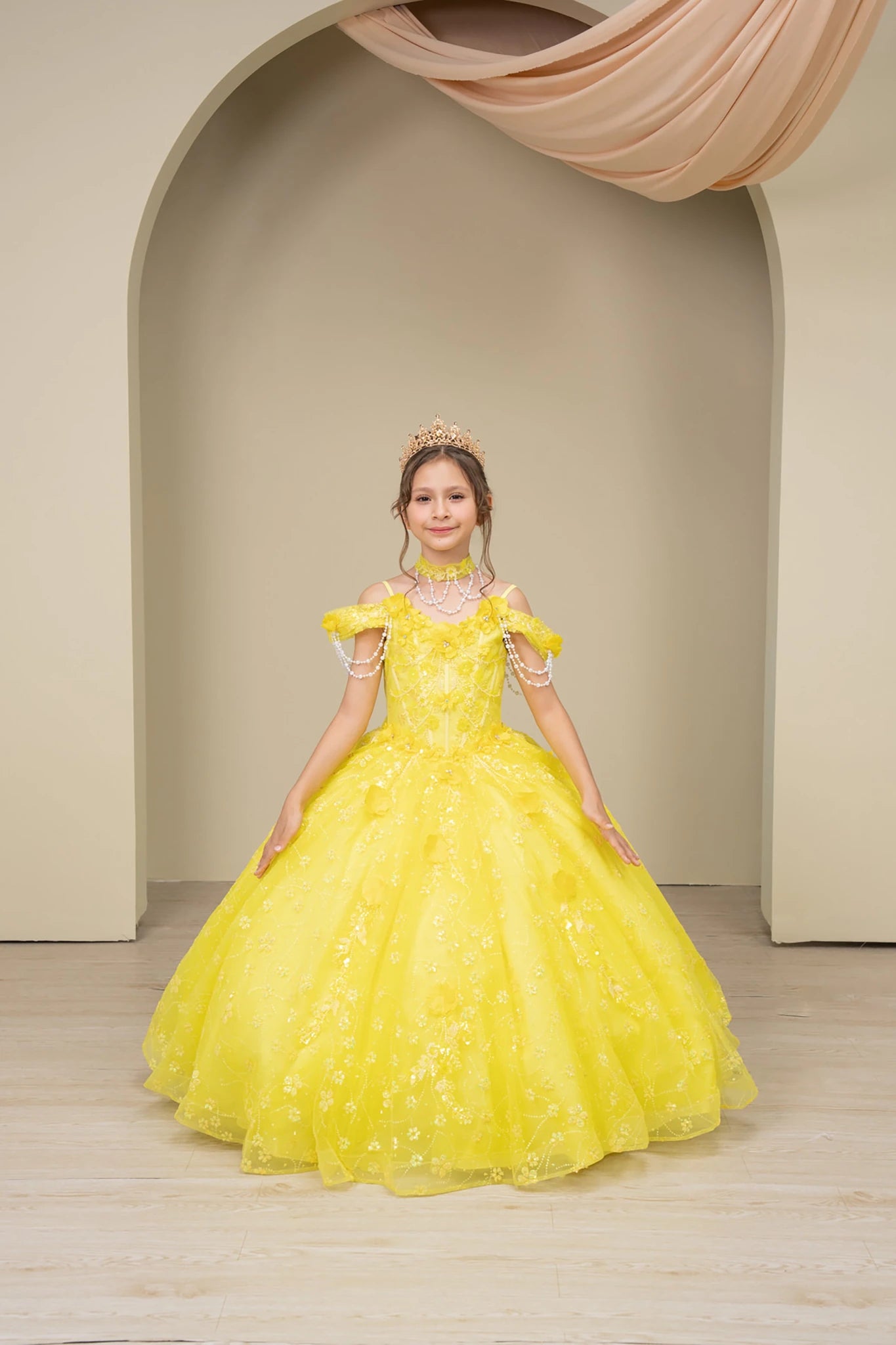 Yellow front view kids mini quinceañera mini quince dress with floral lace and glitter tulle train.