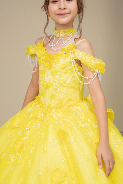 Young girl in a yellow dress with floral details and pearl accessories against a beige background