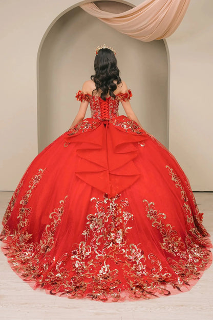 Back full-length view of Red quinceañera ball gown with off shoulder bodice, gold embroidery, floral appliqués, voluminous tulle skirt, corset back, and oversized bow