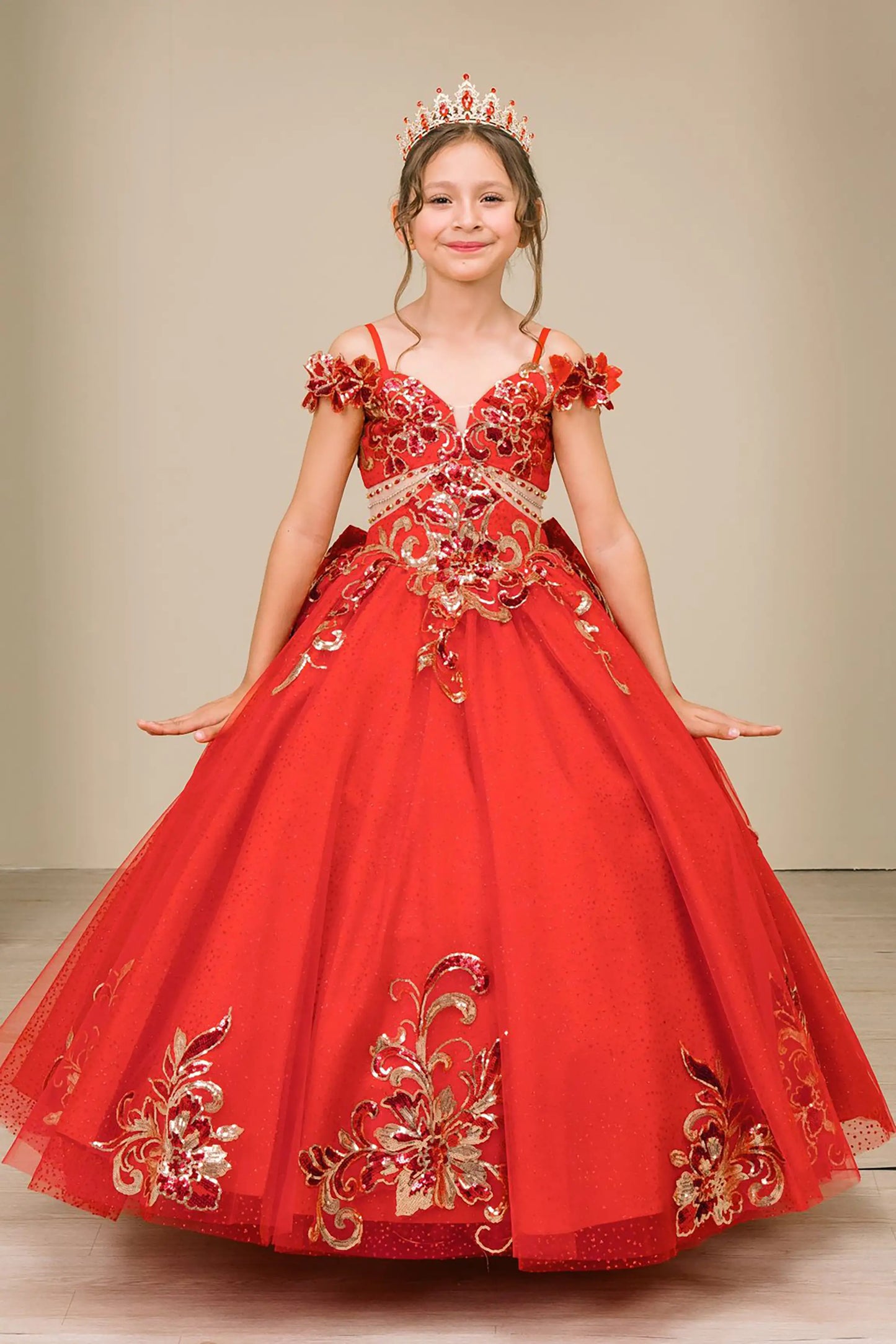 Front full-length view of Red mini quince ball gown with off shoulder floral embroidered bodice, glitter tulle skirt, lace up back, and layered bow