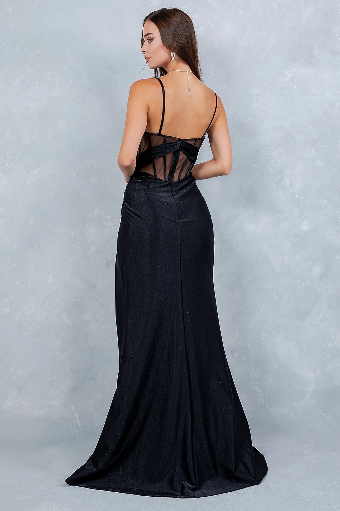 Black prom dress designed with open back and zipper closure