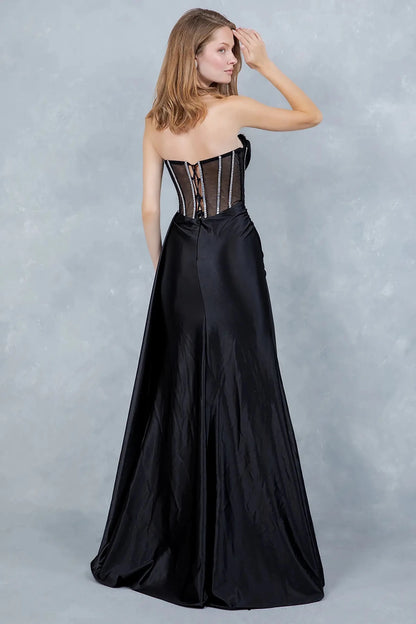 Full front view of a women wearing black satin evening prom dress with strapless rhinestone corset bodice and high slit.