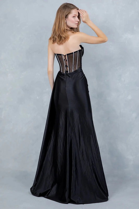 Full front view of a women wearing black satin evening prom dress with strapless rhinestone corset bodice and high slit.