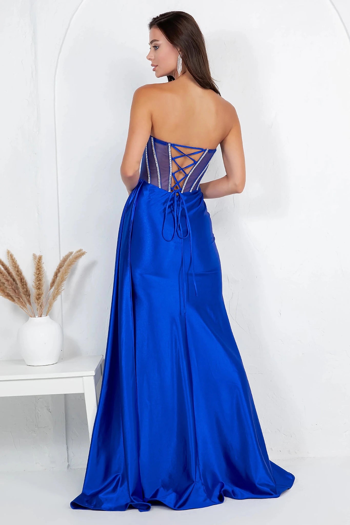 Royal Blue evening gown showcasing lace-up corset back with delicate crisscrossing ties
