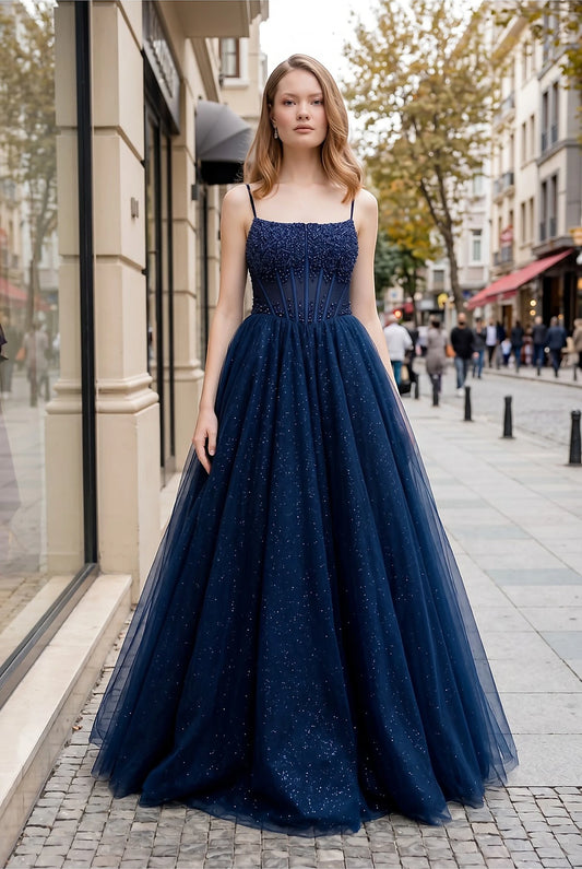 Navy evening dress with sheer corset bodice embellished in beads and crystals