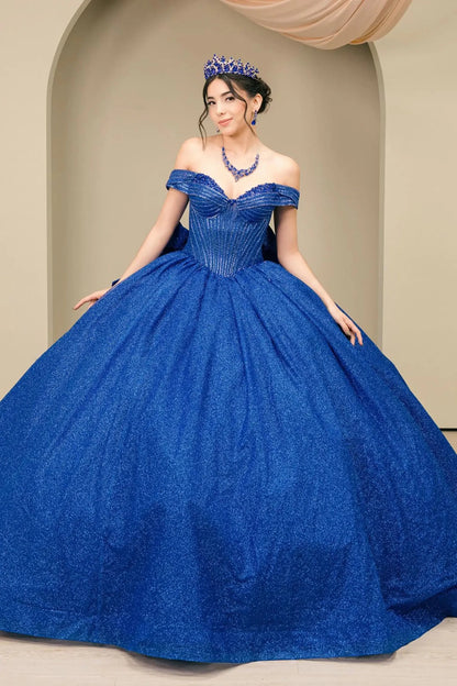 Woman standing front-facing in elegant royal blue ball gown with beaded corset bodice and voluminous glitter tulle skirt

