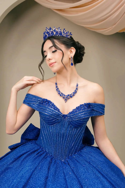 Close-up front-facing view of royal blue ball gown with intricately beaded corset bodice and sweetheart neckline

