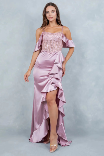 A full-length front view of a woman elegantly wearing a rose gold formal prom dress with a graceful, sweeping train.
