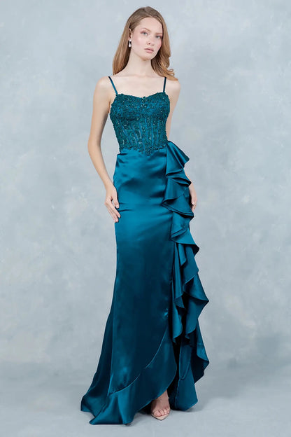 A full-length front view of a woman wearing a blue formal dress with a graceful train.