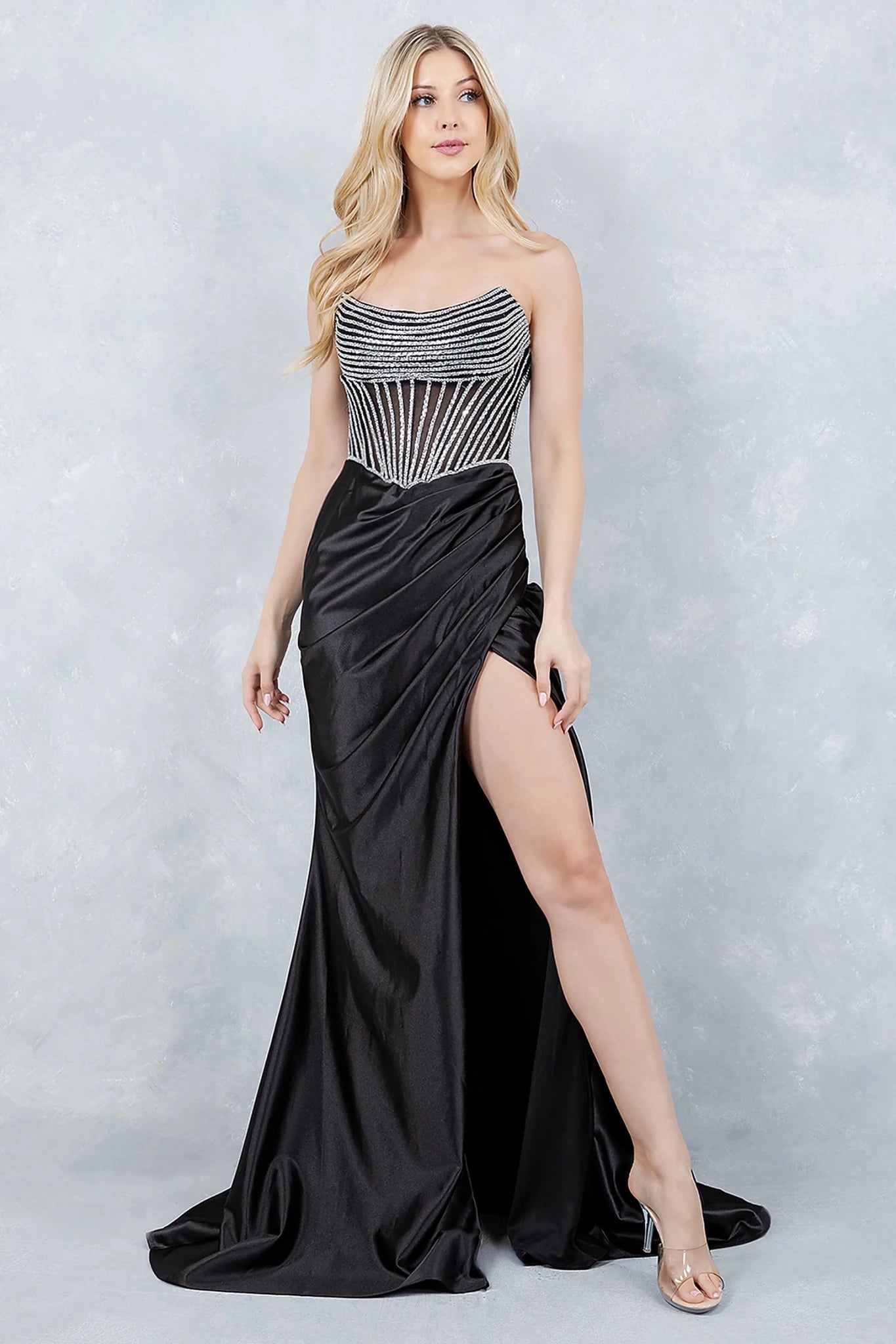 Black evening dress with sheer corset bodice embellished in silver rhinestone beading