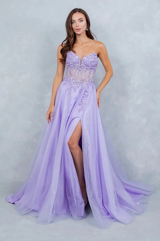 A full-length view of a woman wearing lilac fairytale prom dress with a lace-up corset and layered glitter tulle skirt.