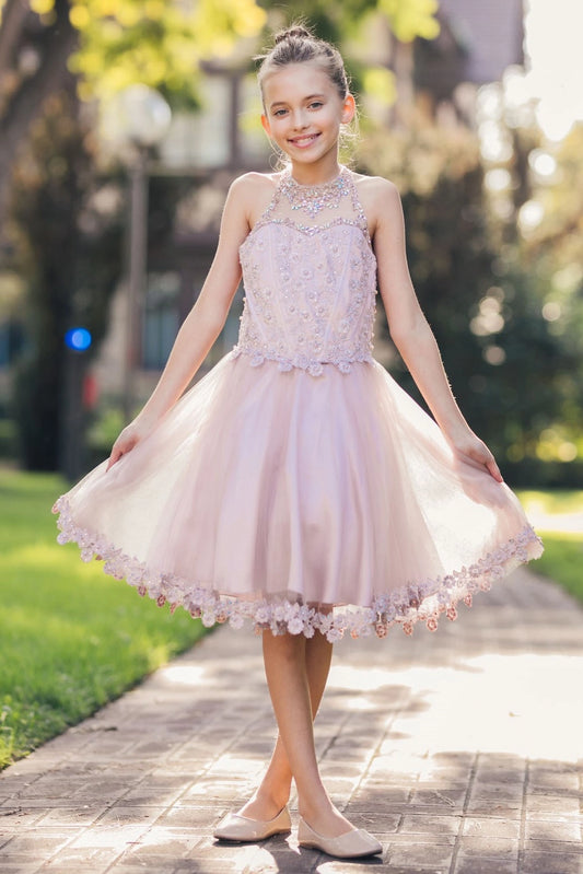 Showcasing with a jeweled illusion halter neckline, this Dusty Rose kids party dress displays elegant detail.