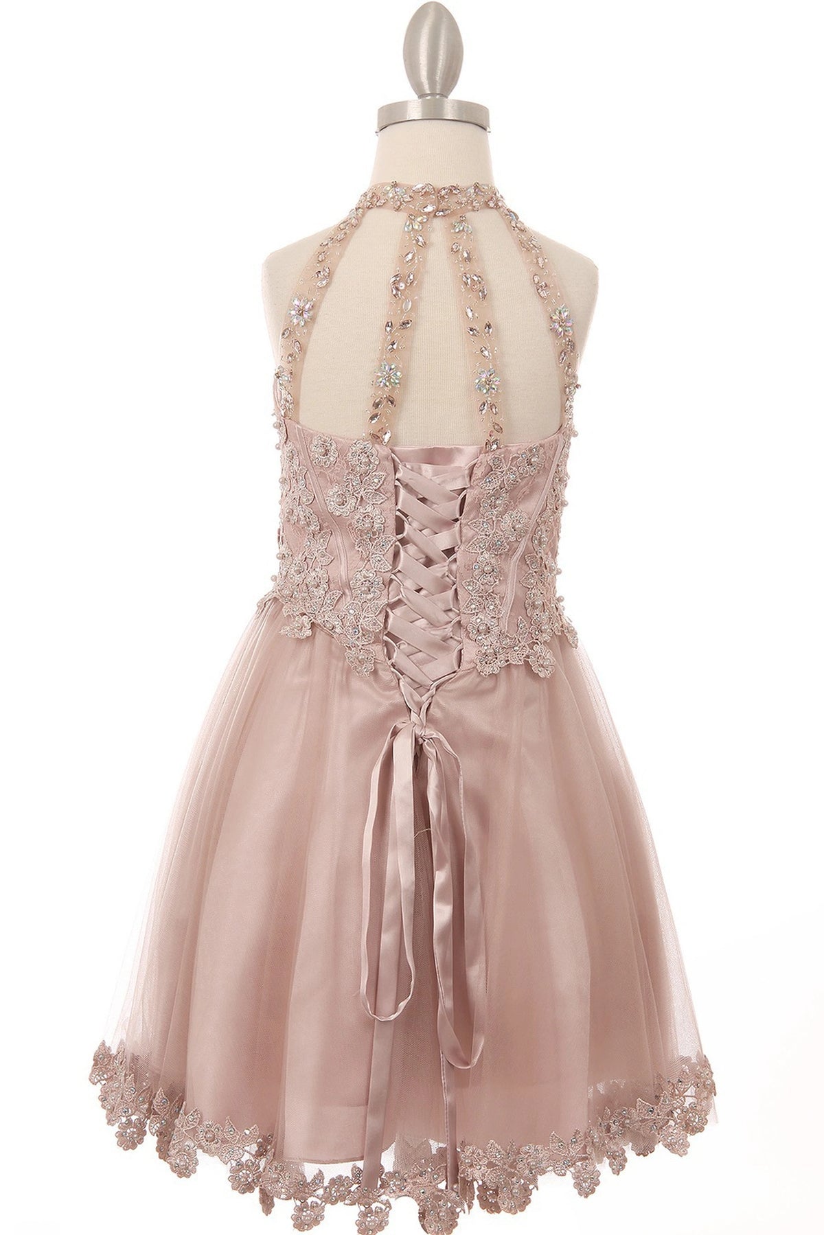 Finished details of crisscross lacing and a halter opening distinguish the Dusty Rose kids party dress.