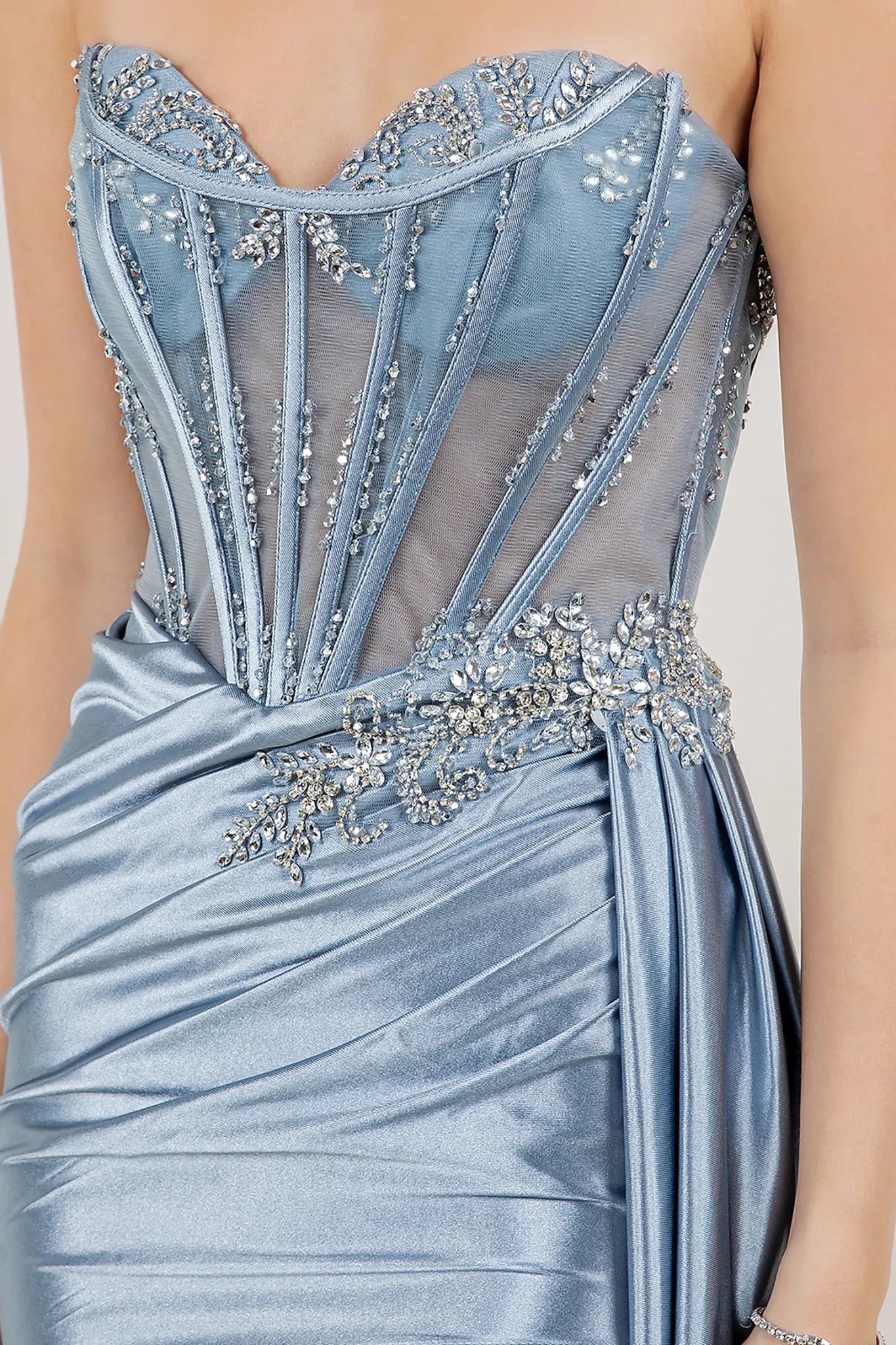 Dusty Blue satin prom dress featuring crystal rhinestone beadwork in floral vine motif