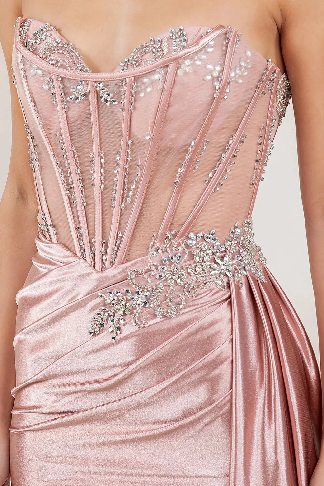 Rose Gold satin prom dress featuring crystal rhinestone beadwork in floral vine motif