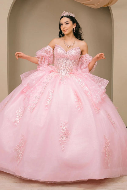 Woman wearing pink off-shoulder sweetheart quinceañera dress with beaded embroidered corset bodice and layered tulle organza full skirt