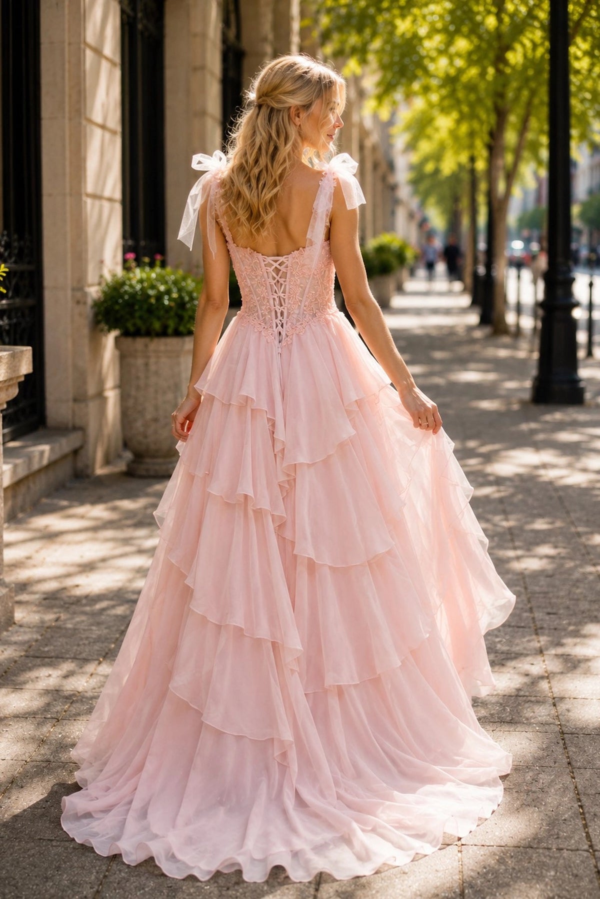 Back view of this Pink prom and evening dress highlights the lace-up back.