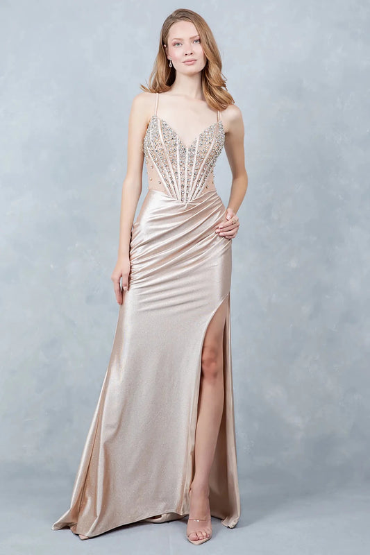 Full front view of a women wearing champagne glitter knit prom dress with crystal bodice.