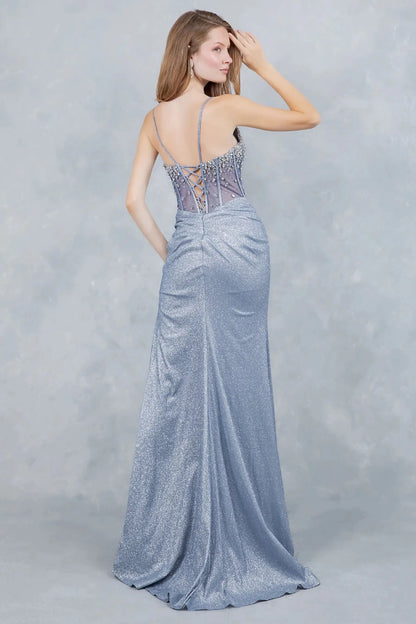Full back view of a woman wearing a blue glitter formal dress showcasing a lace-up corset and fitted silhouette.