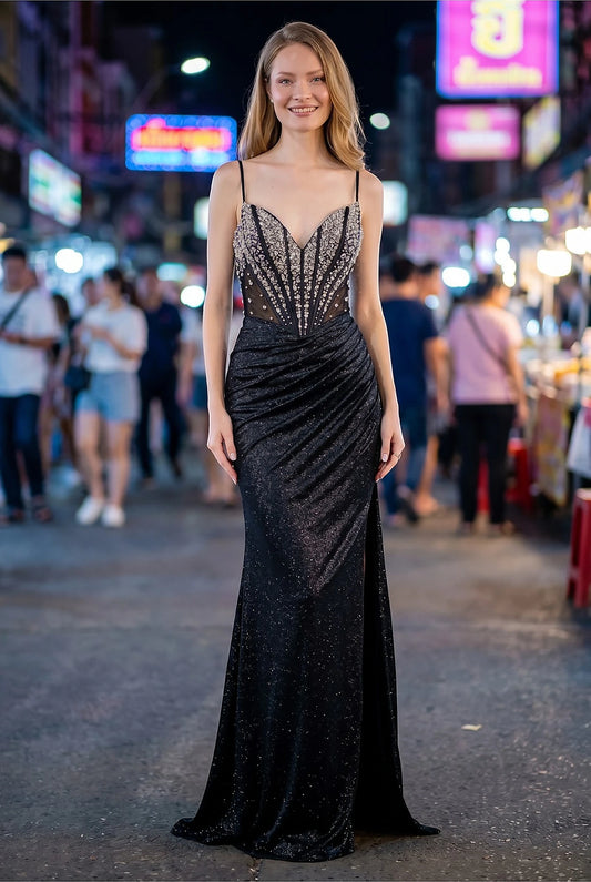Black evening gown crafted from shimmering glitter knit with fitted silhouette