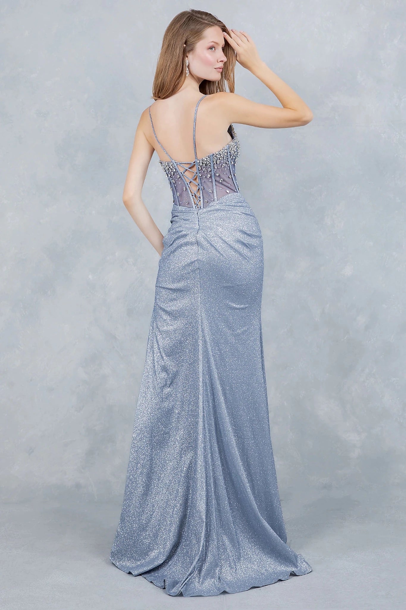 Dusty Blue evening gown showcasing lace-up back with delicate spaghetti straps