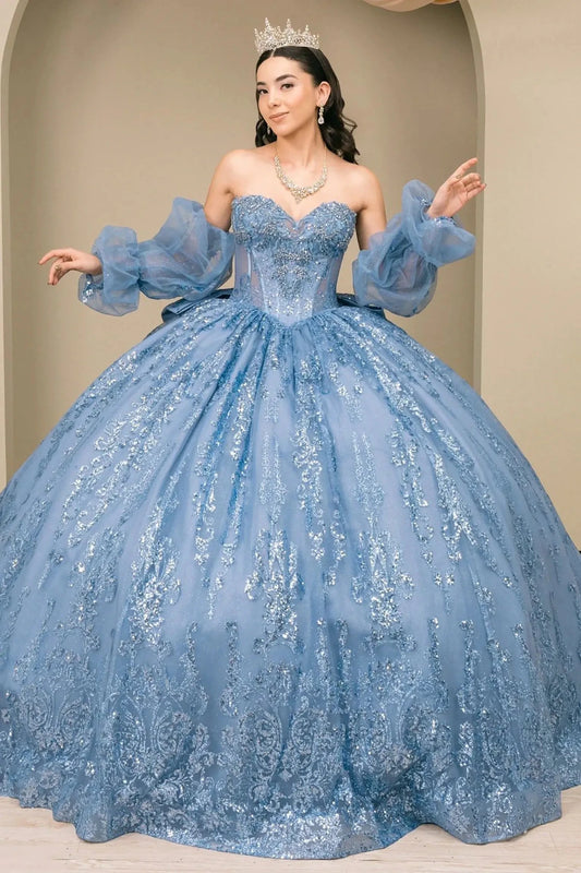 Woman wearing dusty blue off-shoulder sweetheart quinceañera dress with beaded sequin bodice and voluminous tulle skirt with dramatic sleeves