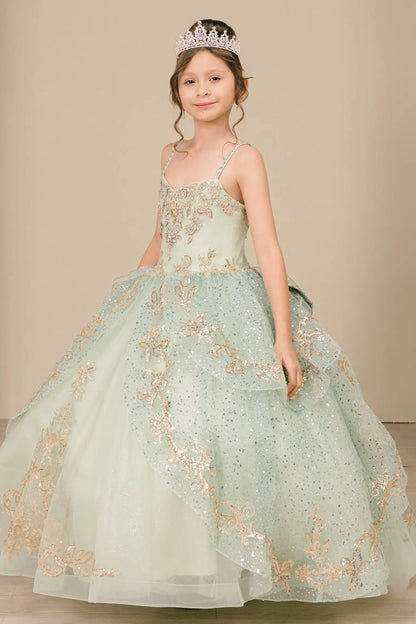Side close-up view of a sage kids quinceañera dress highlighting layered tulle skirt, embroidered bodice, and floral appliques.