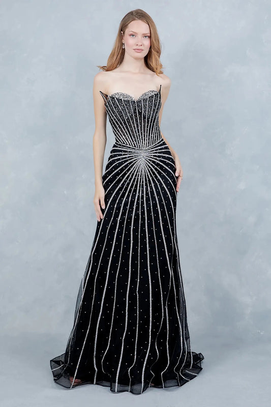 Full front view of a women wearing black crystal mermaid prom dress with strapless corset bodice.