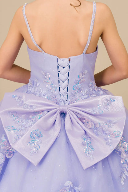 Bodice back close-up of a kid wearing lilac mini quinceañera dress showing floral appliques, butterfly collar detail, and subtle glitter accents.