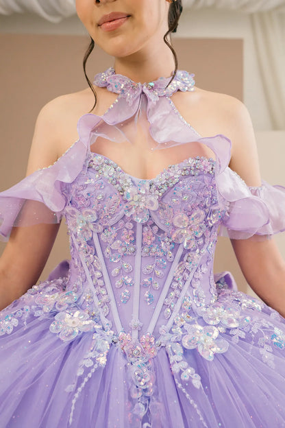 Bodice close-up of a woman wearing lilac quinceañera dress showing floral appliques, butterfly collar detail, and sparkling beadwork accents.
