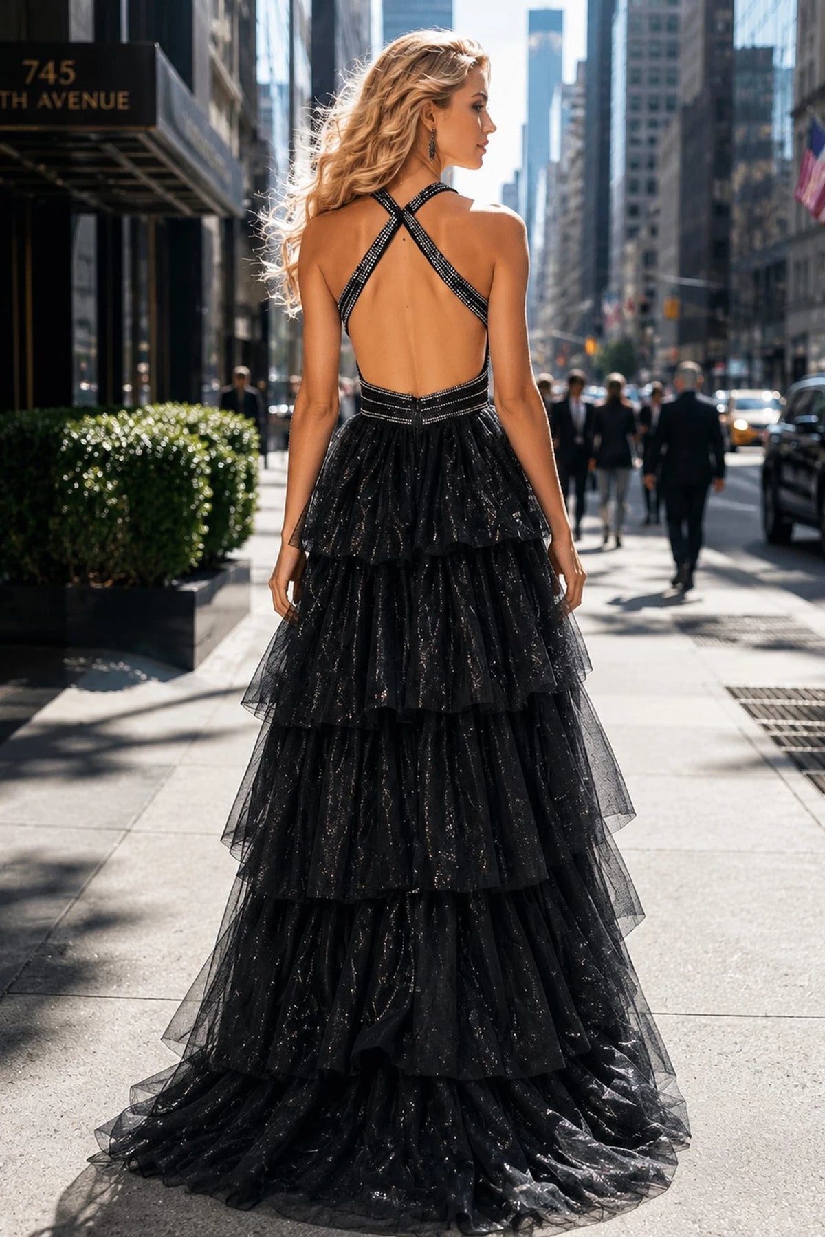Back view of this Black prom and evening dress highlights the crossed back straps.