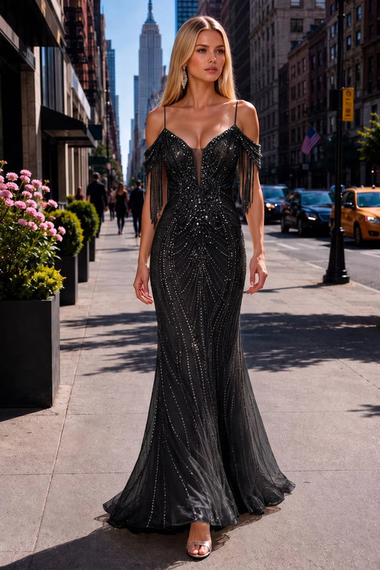 Black prom and evening dress with a v-neck neckline and mesh skirt.